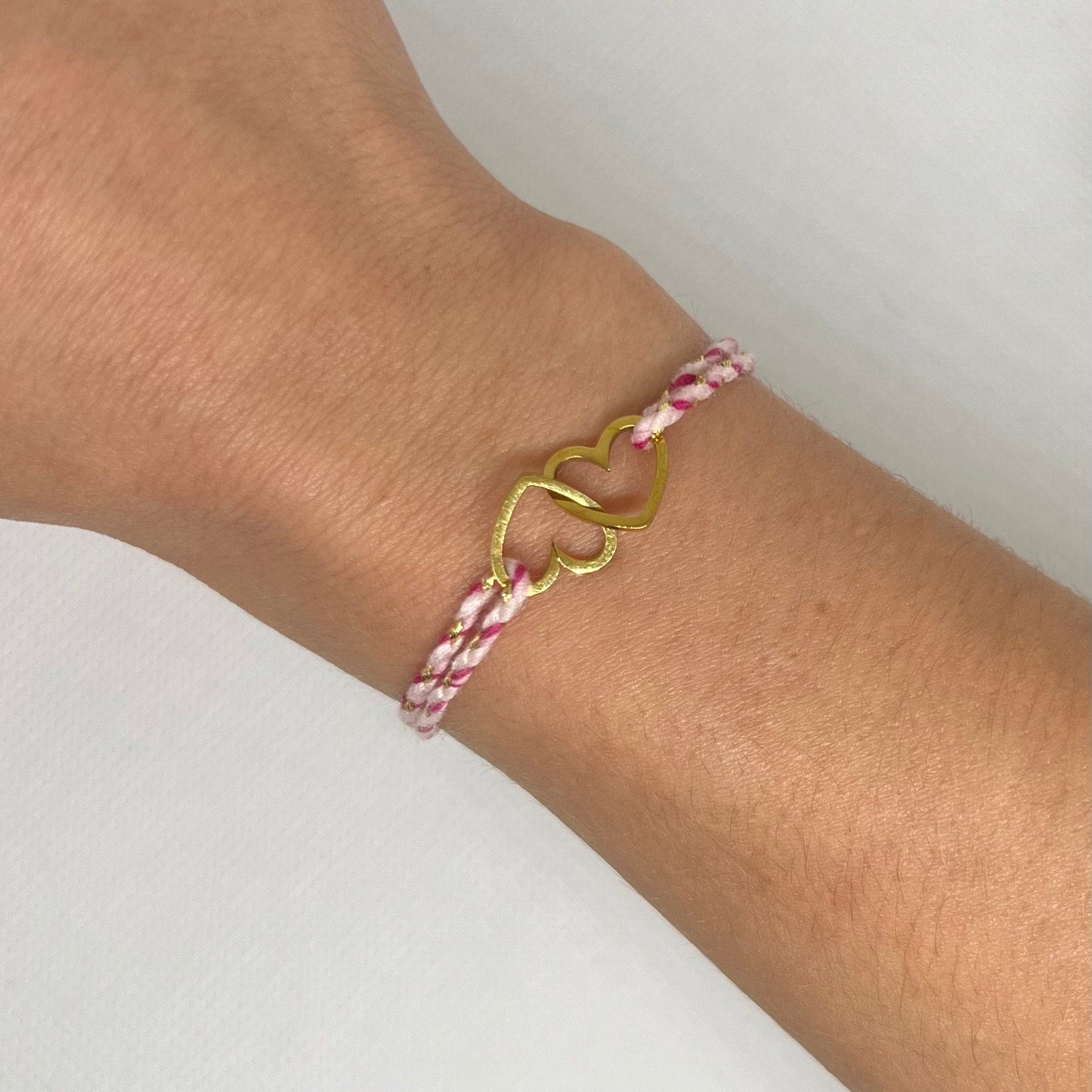 Bracelet Cœurs Entrelacés Acier Inoxydable - Cordon tressé rose