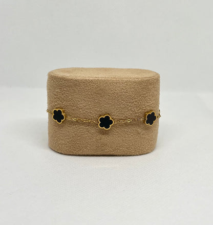 Bracelet trèfle noir "Estelle" chaîne dorée acier inoxydable