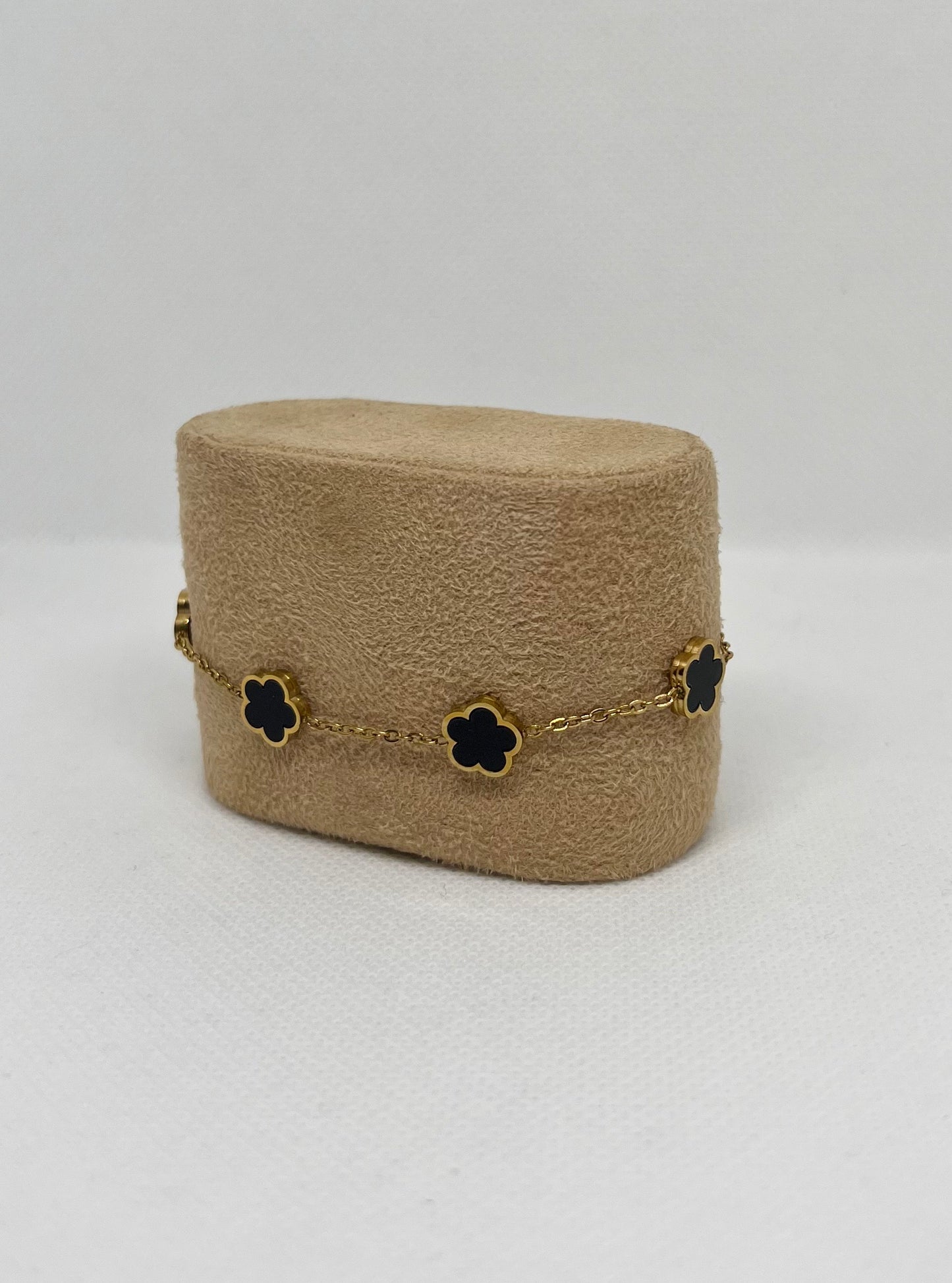 Bracelet trèfle noir "Estelle" chaîne dorée acier inoxydable