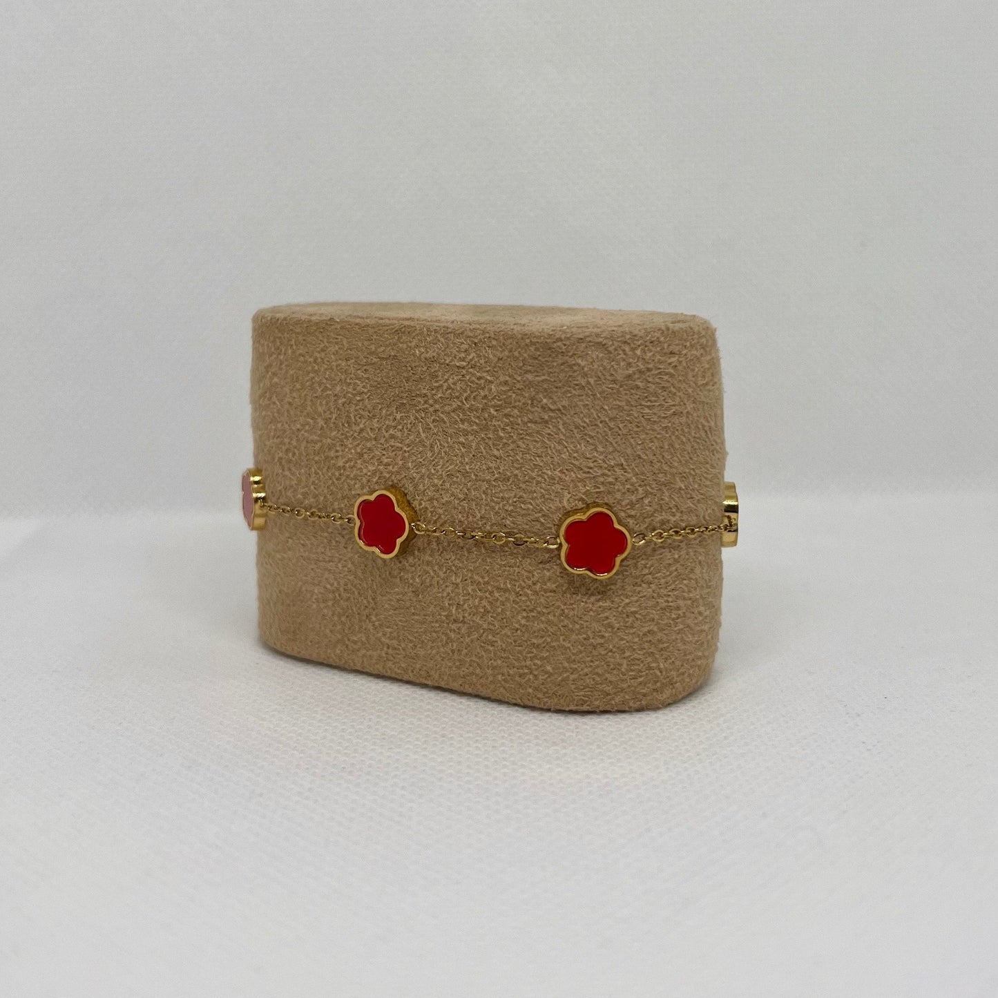 Bracelet trèfle rouge "Estelle" chaîne dorée acier inoxydable