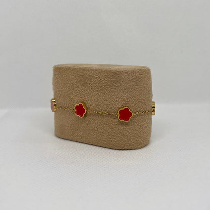 Bracelet trèfle rouge "Estelle" chaîne dorée acier inoxydable