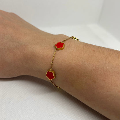 Bracelet trèfle rouge "Estelle" chaîne dorée acier inoxydable