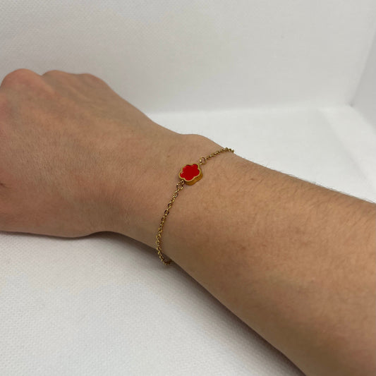 Bracelet trèfle rouge "Sarah" chaîne dorée acier inoxydable