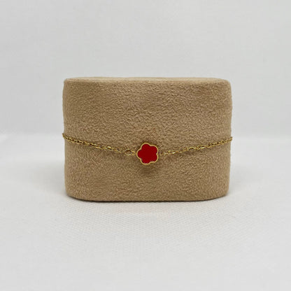 Bracelet trèfle rouge "Sarah" chaîne dorée acier inoxydable