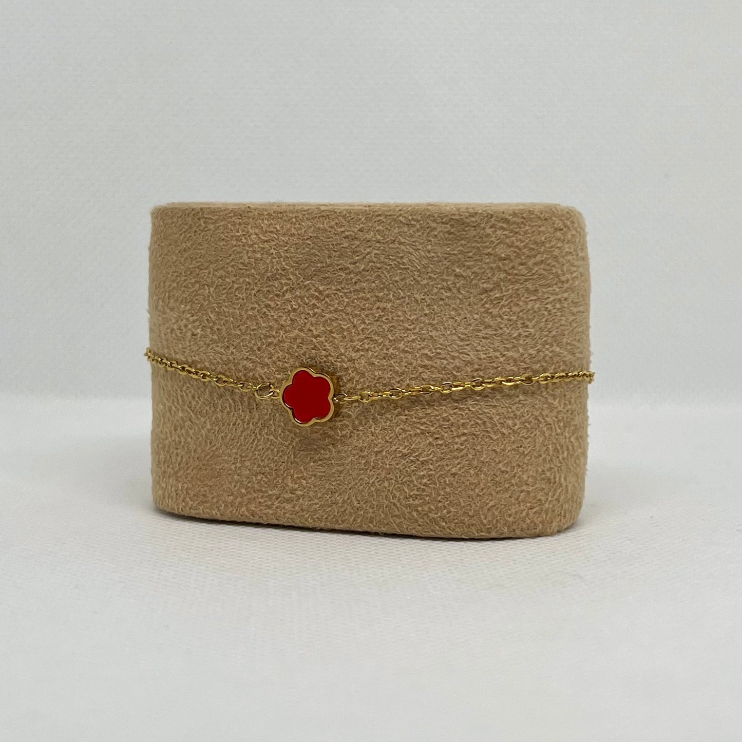 Bracelet trèfle rouge "Sarah" chaîne dorée acier inoxydable