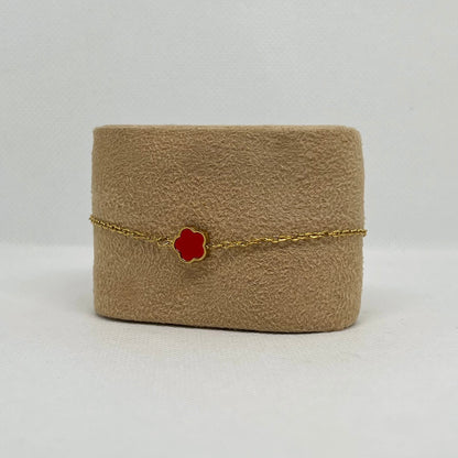 Bracelet trèfle rouge "Sarah" chaîne dorée acier inoxydable