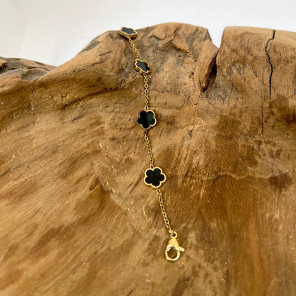 Bracelet trèfle noir "Estelle" chaîne dorée acier inoxydable