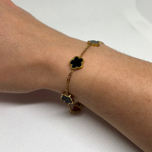Bracelet trèfle noir "Estelle" chaîne dorée acier inoxydable